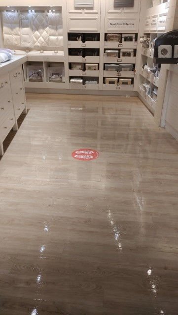 A gleaming retail floor cleaned by Prairie Building Maintenance